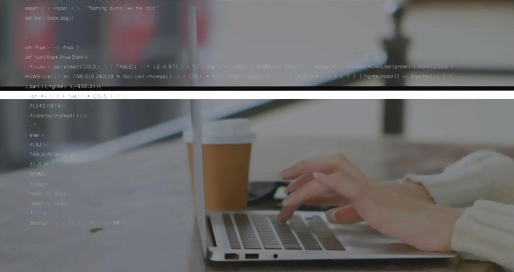 Designer reviewing UX wireframes on a screen in a professional studio environment